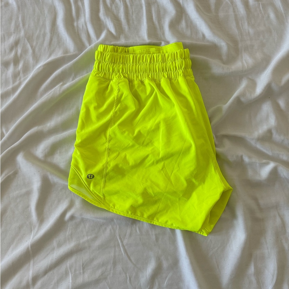 lululemon hotty hots 4” low rise in neon yellow size 10